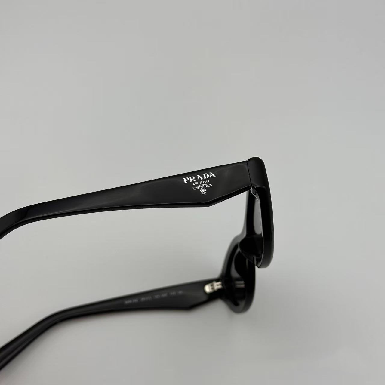 PRADA SPR26Z Black Sunglasses Polished Black Gray Tint Silver Logo