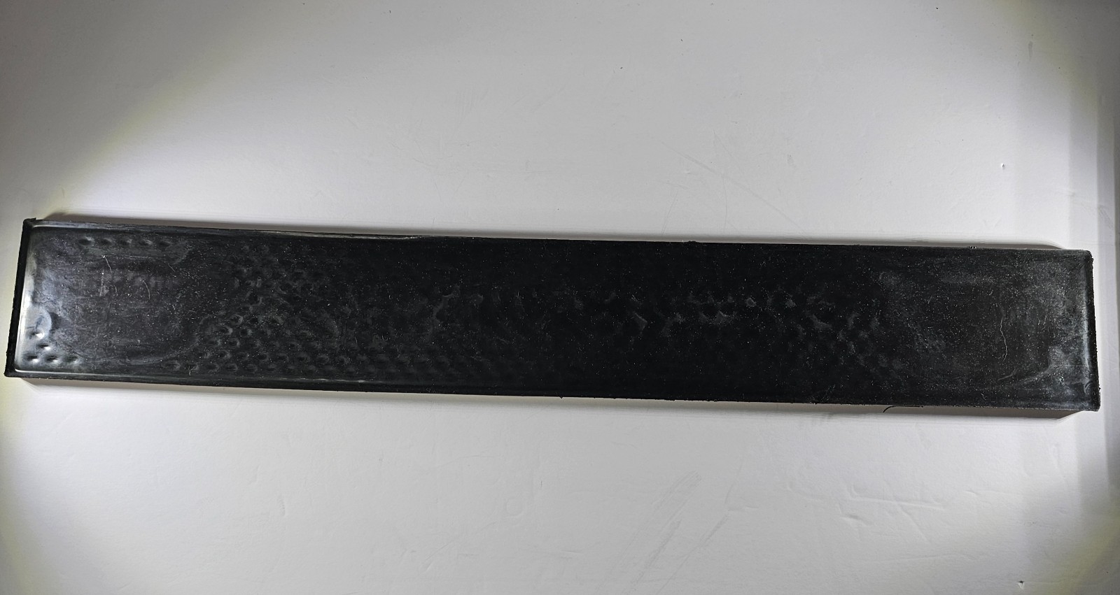 Dr. McGillicuddy's rubber bar mat featuring the brand name A.P. Mcgillicuddys