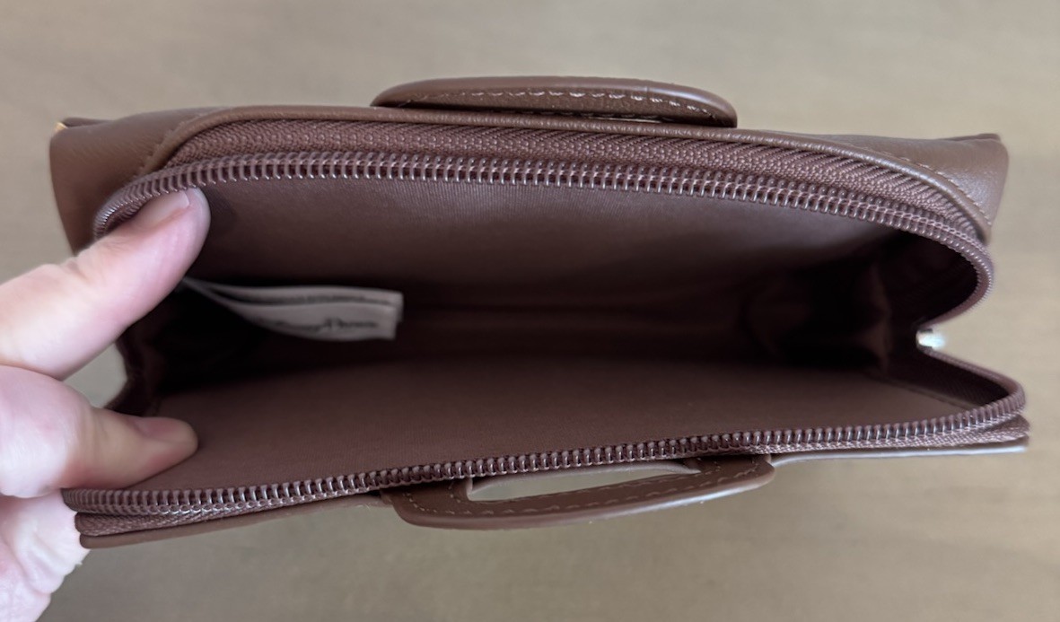 Disney Parks “ It’s A Small World” Traveler Clutch