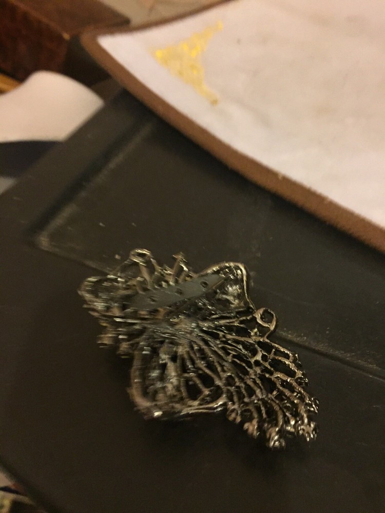 Black Metal And Crystal Brooch