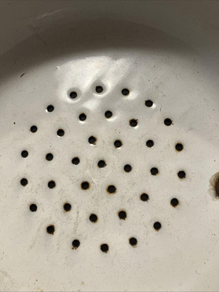 white enamelware colander