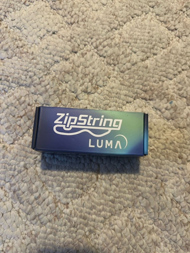 ZipString Luma: Patented Glow-in-The-Dark Flying String Toy - Endless Loops!