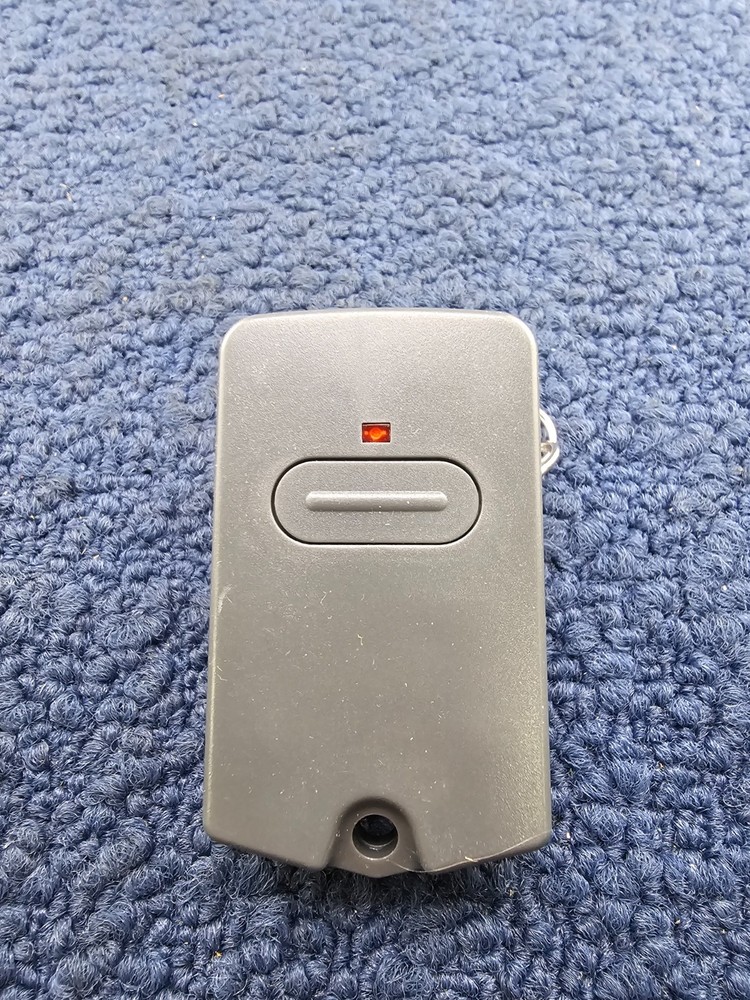Single Button Entry Transmitter Gate Garage Opener FCC ID: X4R318A