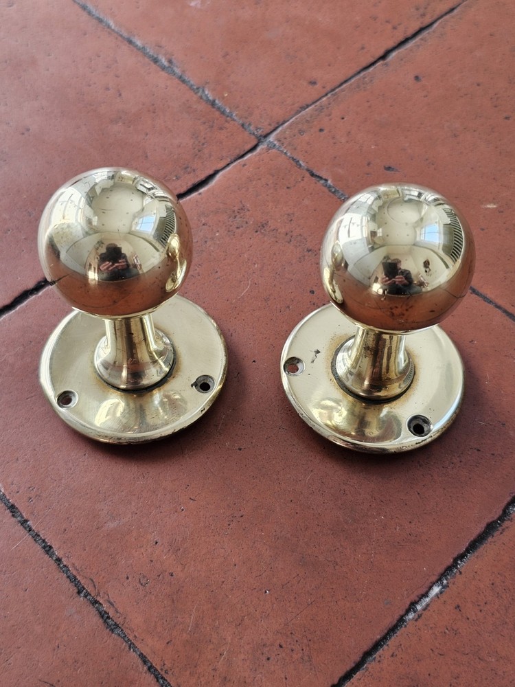 Antique original brass door knobs