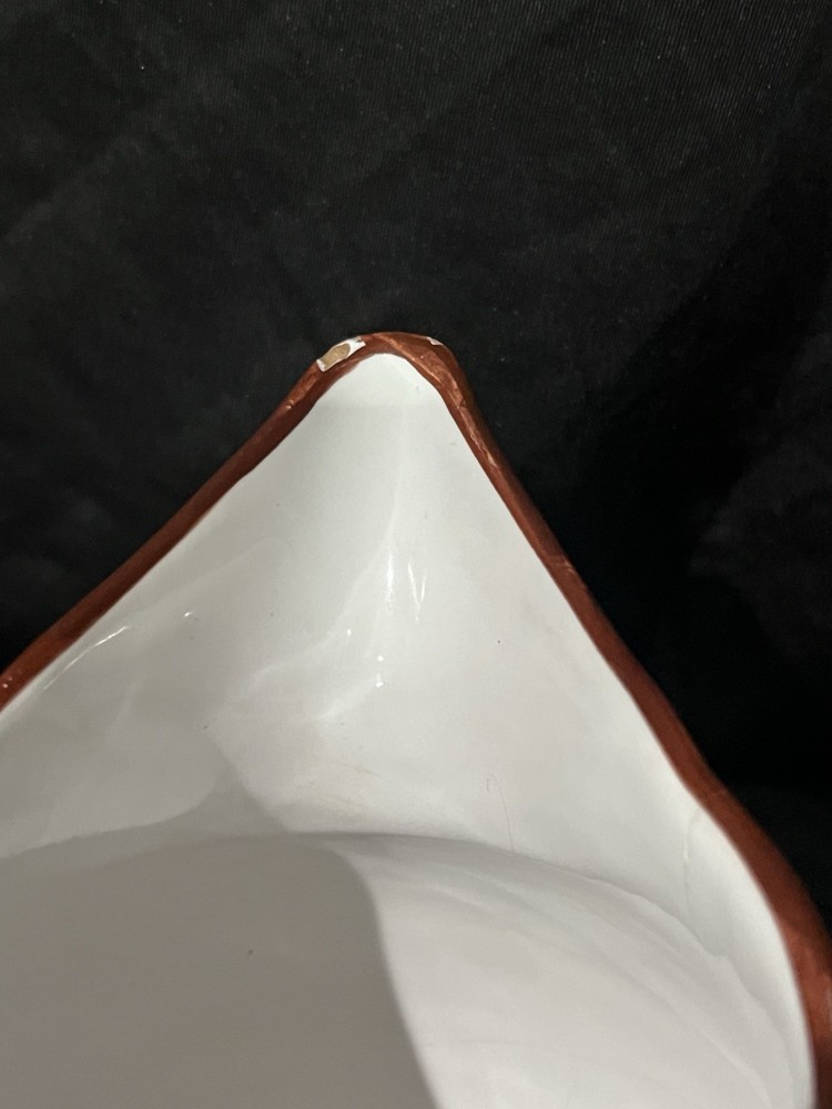 Deruta pottery pitcher, specifically featuring the Arabesco Bird design