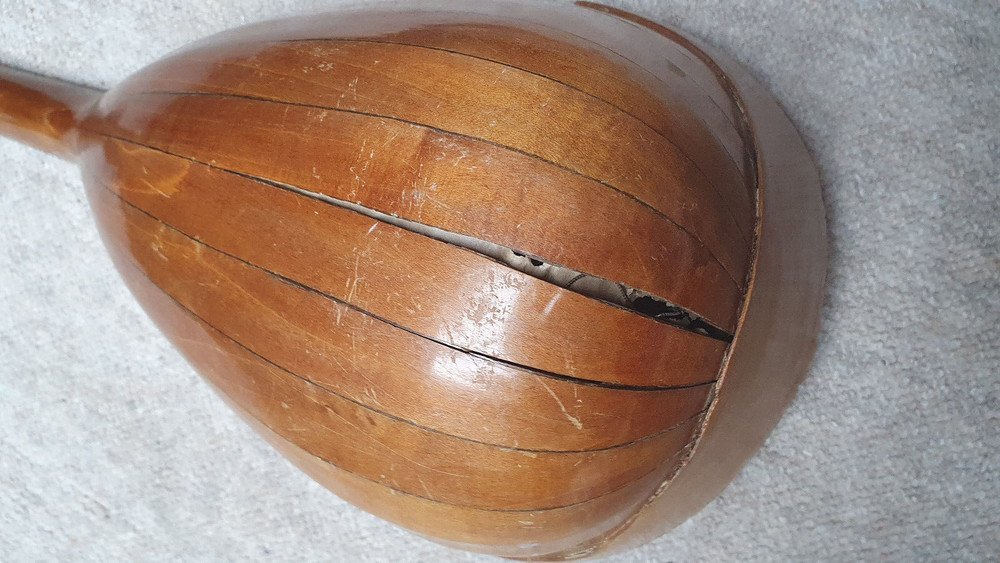 old mandolin, needs repair