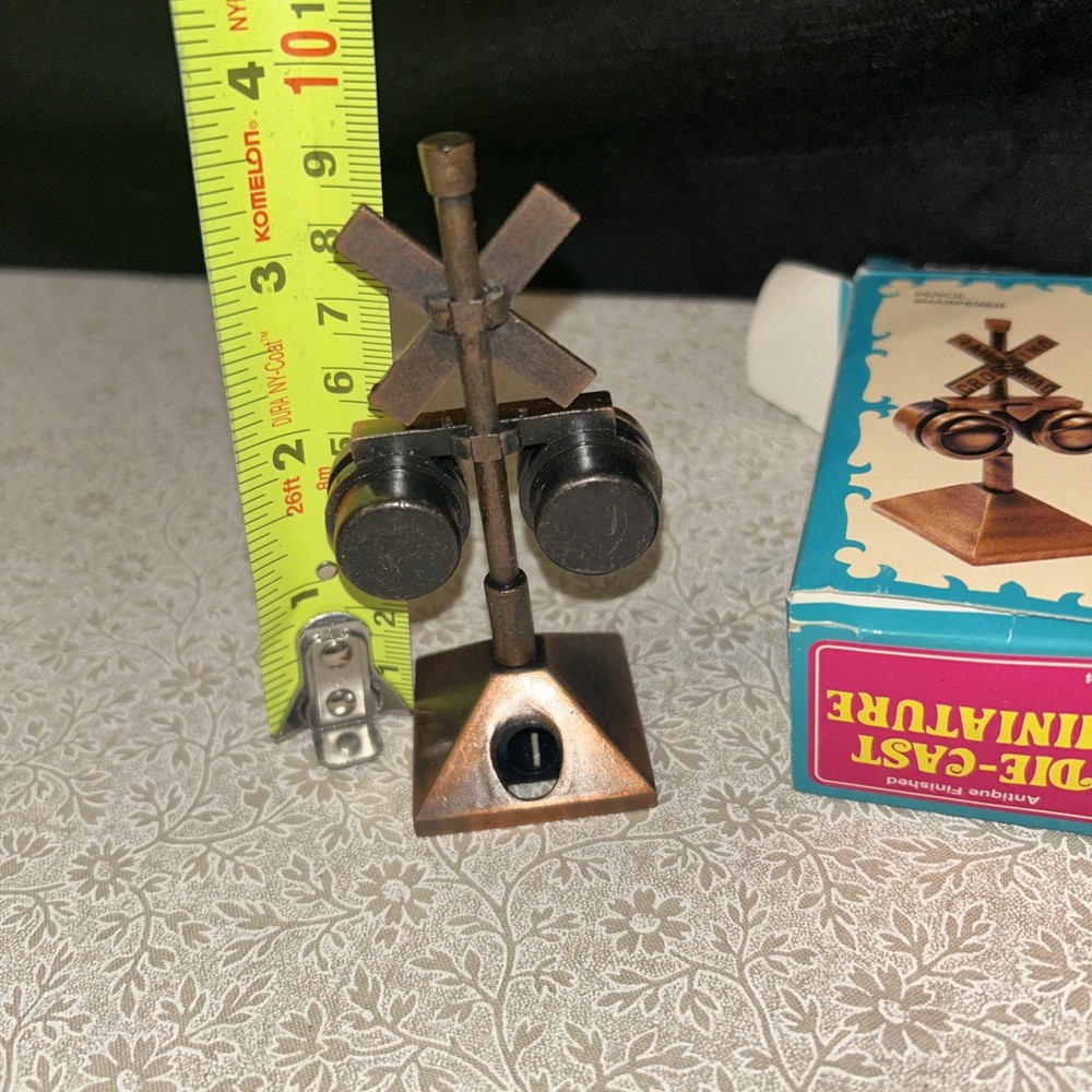 vintage die cast miniature pencil sharpener