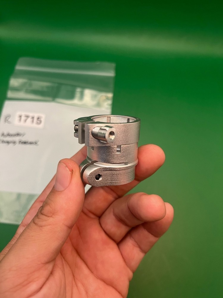 Autococker Clamping Feedneck