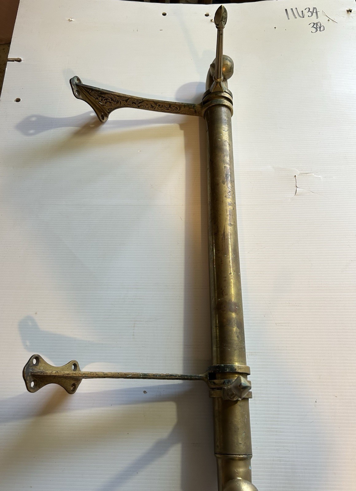 ANTIQUE BRASS BAR END RAIL AND FANCY DECORATED RAIL HANGERS