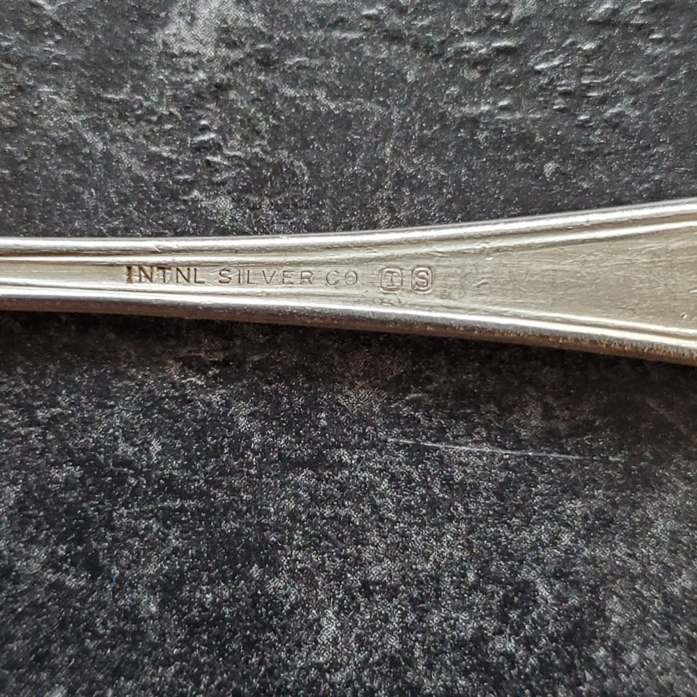 UNITED NUT CO. SILVERPLATE DEMITASSE SPOON-INTERNATIONAL SILVER CO.