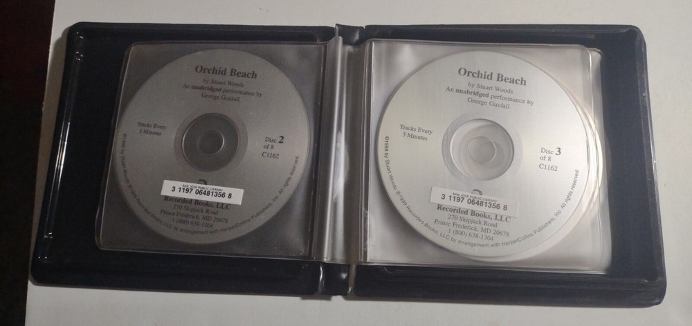 Orchid Beach by Stuart Woods. 7 Compact Discs. Missing Disc 8.