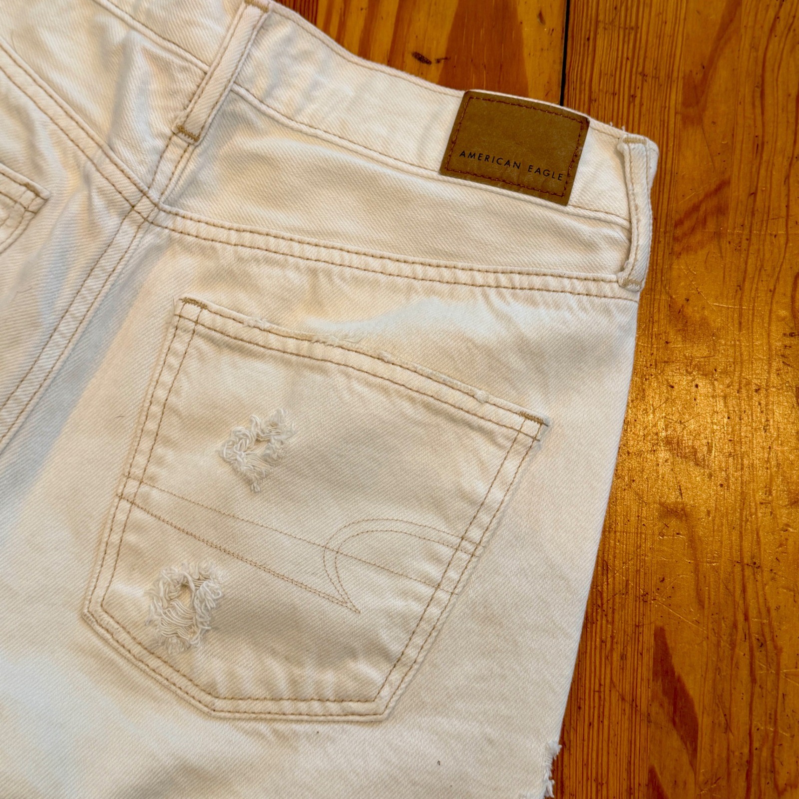American Eagle White Distressed High Waisted Denim Shorts Size 4 Raw Hem