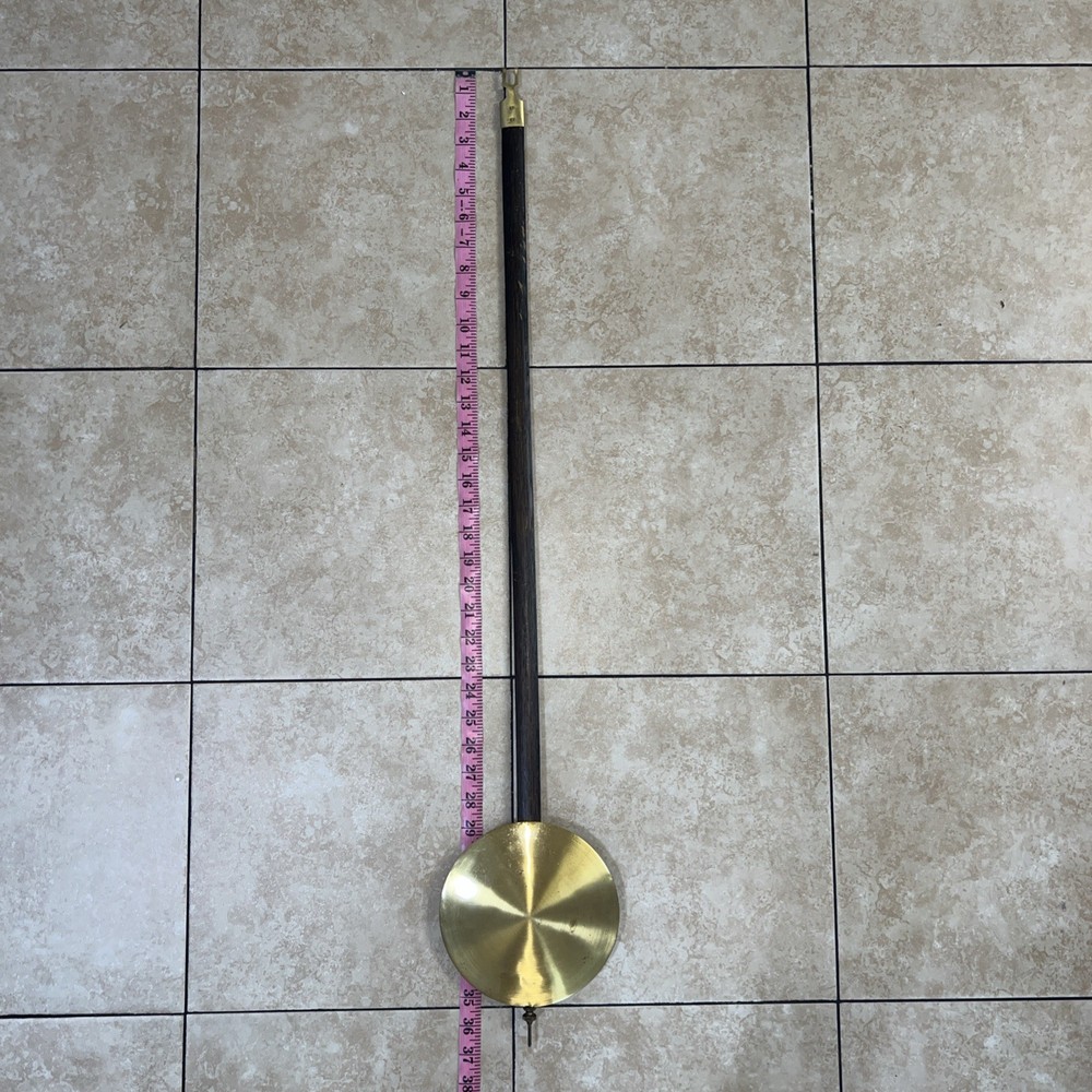 Junghans vintage grandfather clock pendulum.