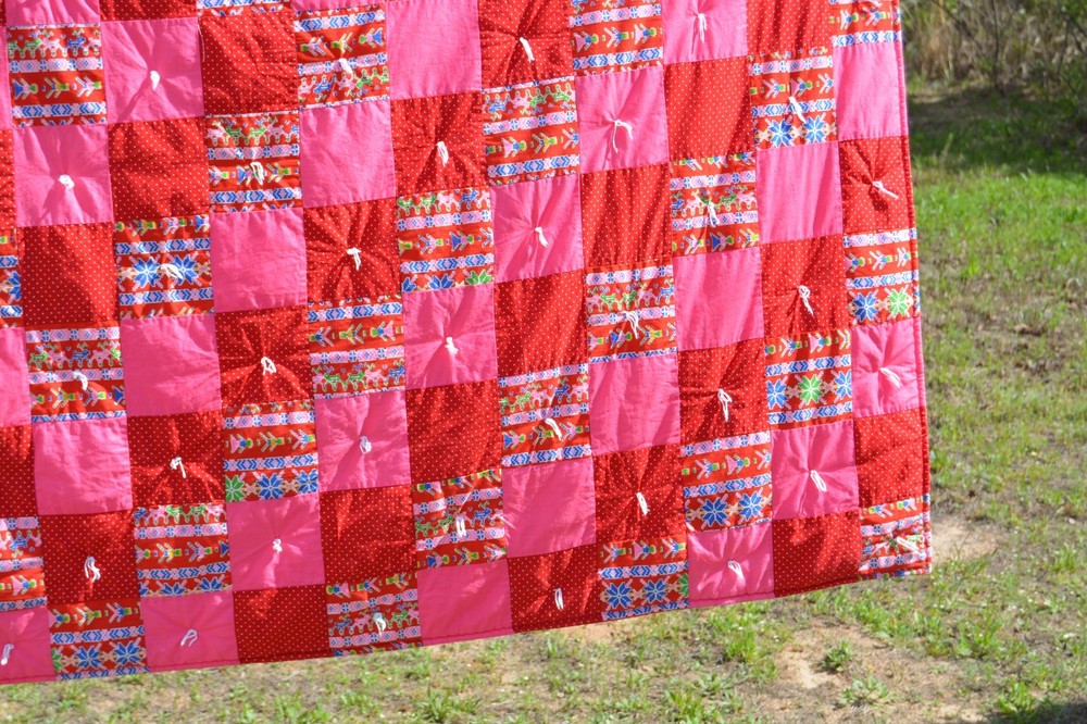 Homemade pink/red tied method patchwork quilt 57x82"