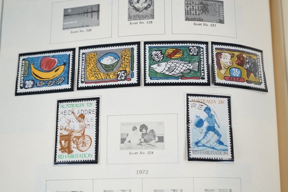 WORLDWIDE A-L 1970s COLLECTION OF 875+ STAMPS MINT & USED STORED IN SCOTT ALBUM