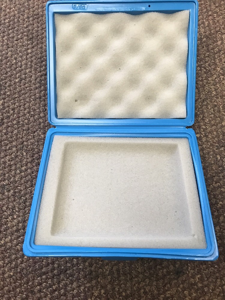 small plastic storage case 6”by 7” By 2” High