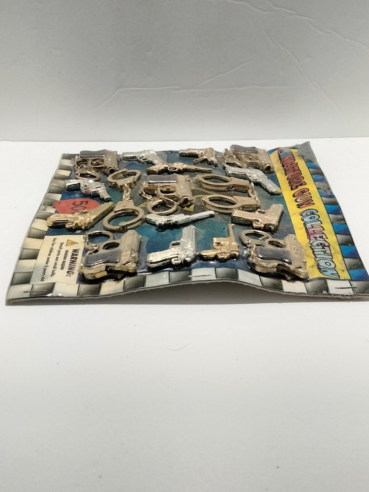 Vending machine display card miniature gun collection