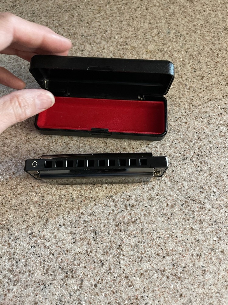 Neuma 10-Hole Blues Harmonica in a protective case