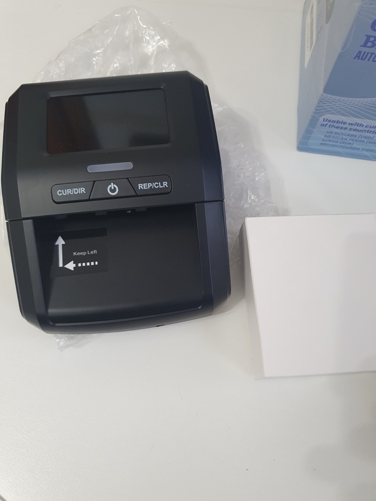 Counterfeit Bill Detector