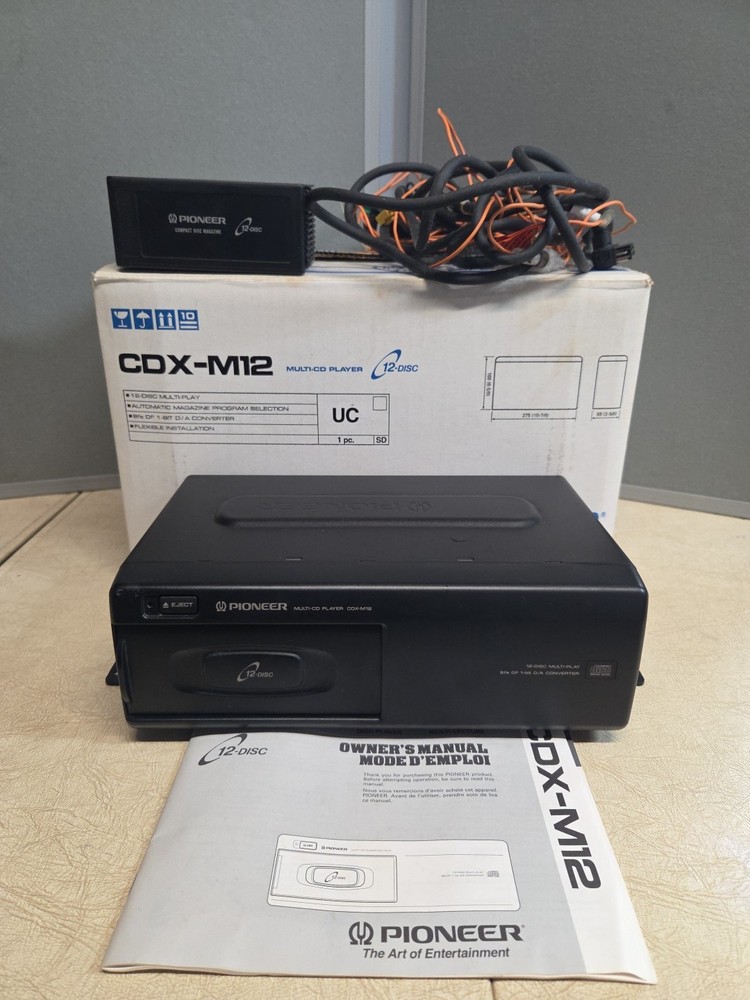 CDX-M12 Multi-CD player 12-Disc/ Compact Disc Magazine