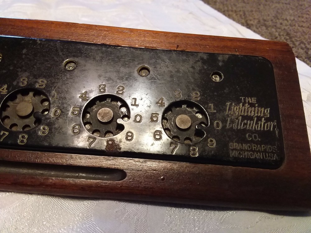 ANTIQUE c.1908 "LIGHTNING CALCULATOR COMPANY" ADDING MACHINE, WOOD BASE,13" L