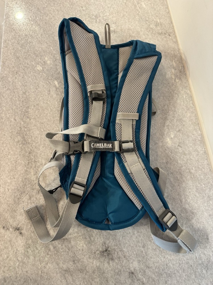 CamelBak Velocity 70 oz Hydration Pack Teal- No Bladder