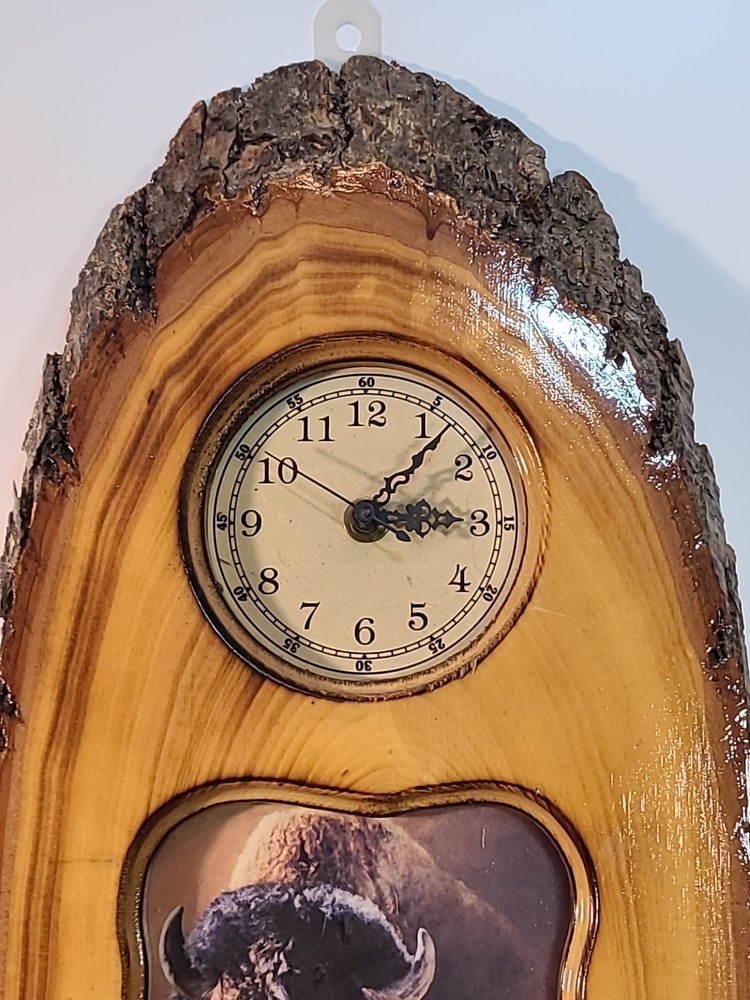 Vintage Laquered Wood Tree Slice Buffalo Clock. Clock Does Not Work.