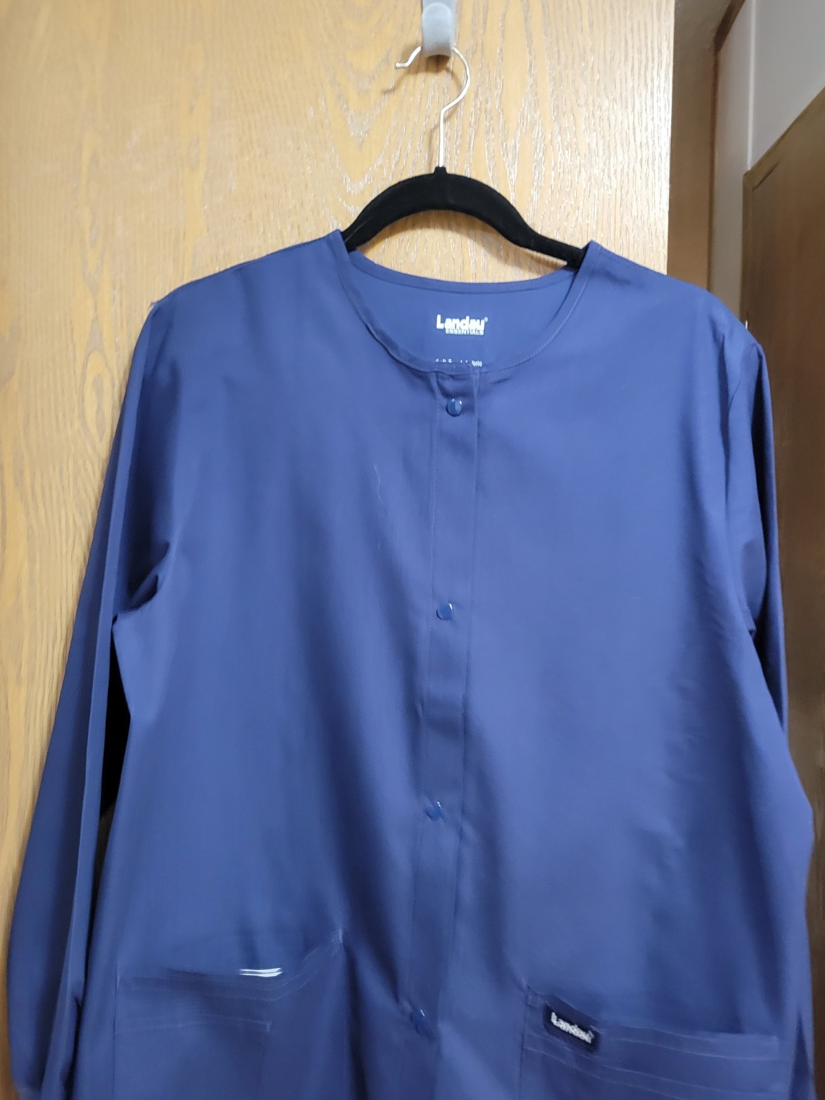 NWT. Med Unisex Long Sleeve Scrub Top/Jacket By Landau. Measurements Posted.