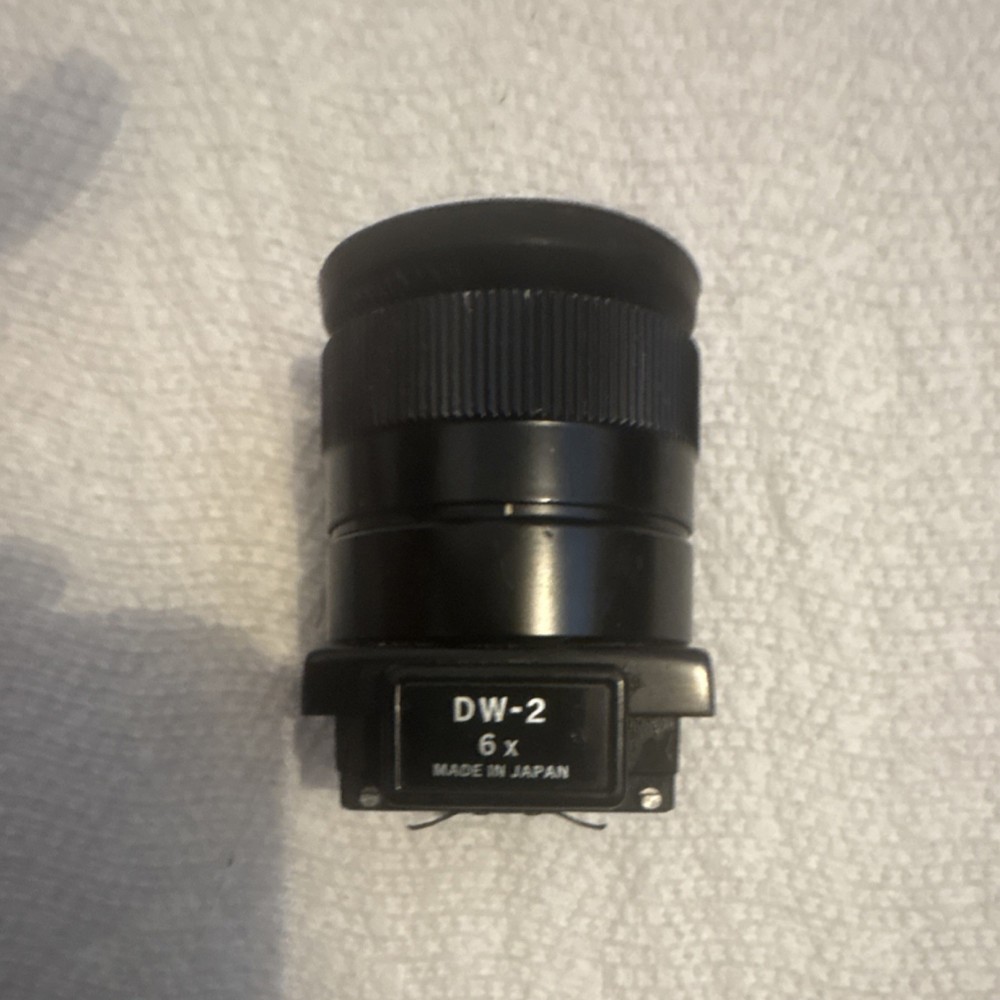 This item is a vintage Nikon DW-2 6x Magnifier