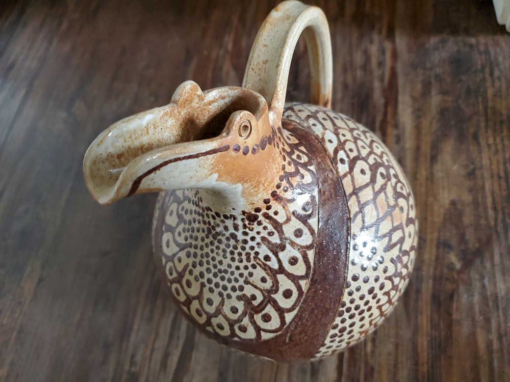 Amazing Pottery Pitcher Signed SF