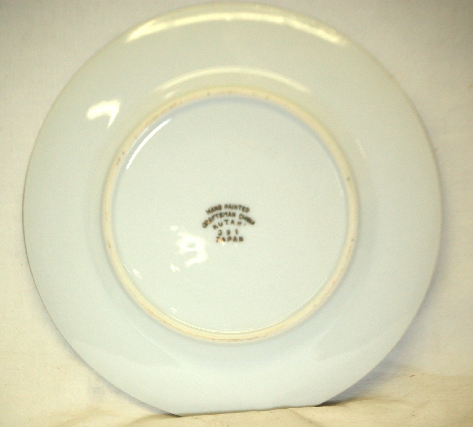 Kutani pie plate with bamboo red yellow flowers encrusted