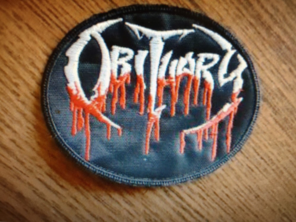 OBITUARY,SEW ON SILVER AND RED EMBROIDERED PATCH