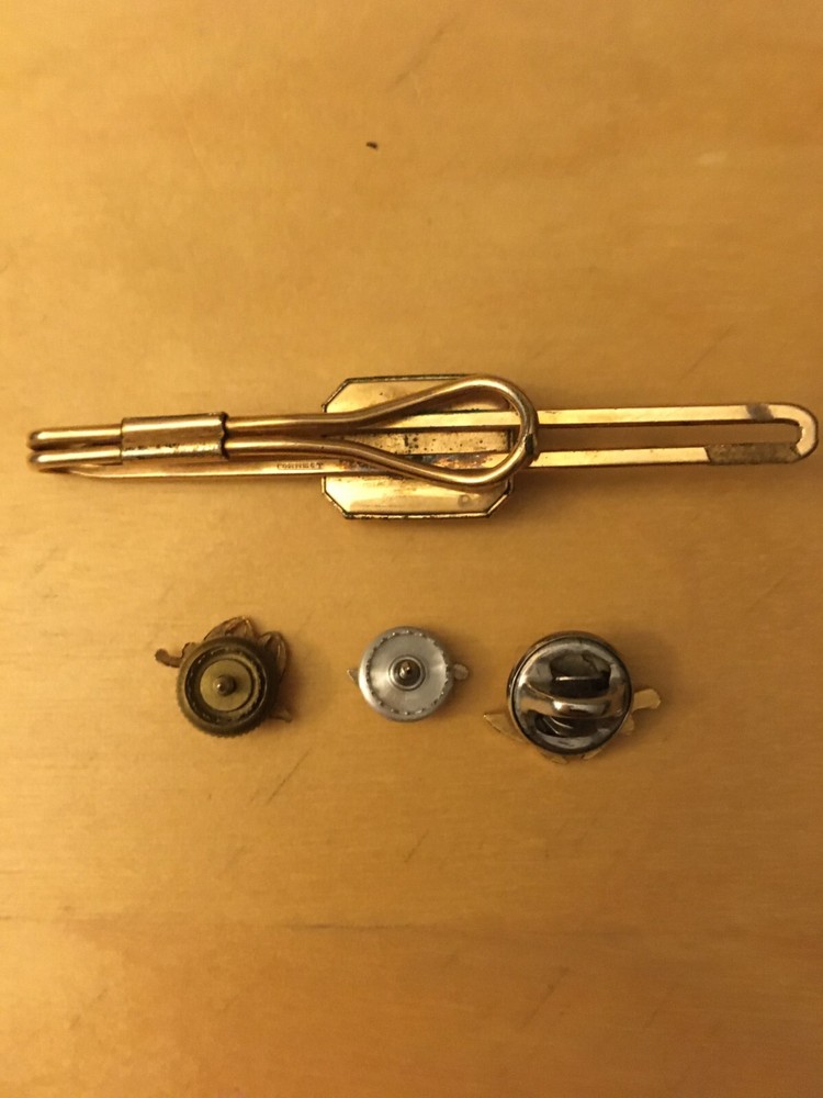 PALESTINE TIE CLIP AND THREE LAPEL PINS.