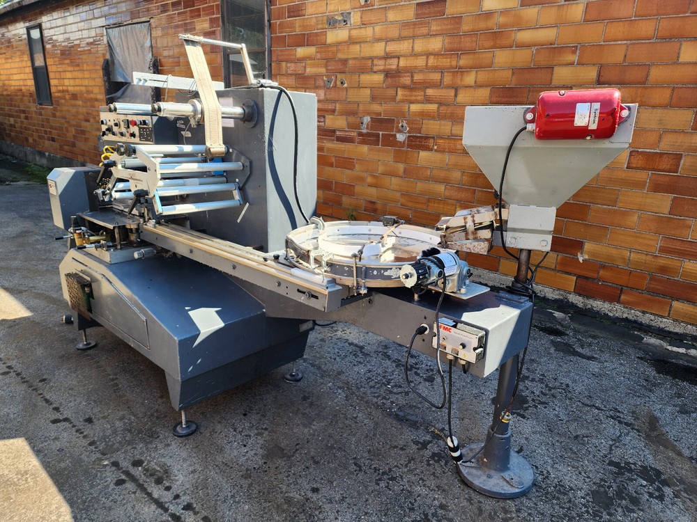 SEMCA HORIZONTAL HIGH SPEED WRAPPING MACHINE MODEL 90