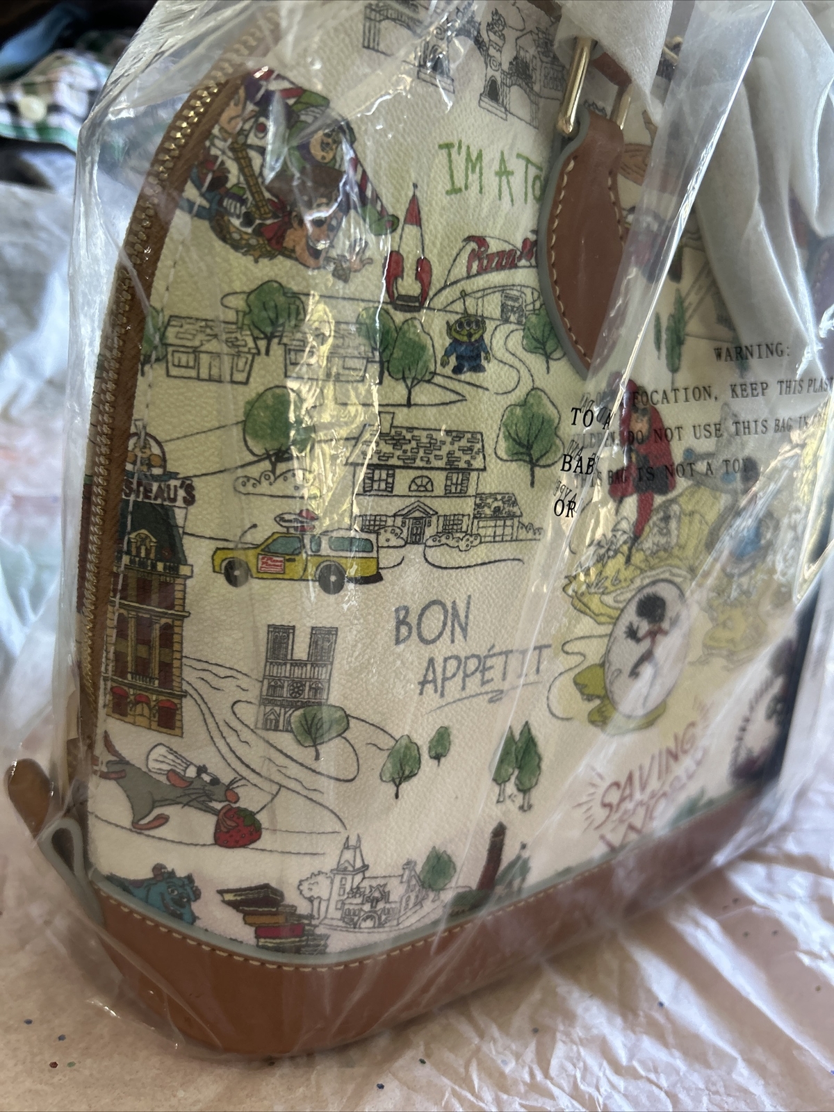 NEW DOONEY BOURKE DISNEYPARKS PIXAR MAP SATCHEL RATATOUILLE INSIDE OUT TOY STORY
