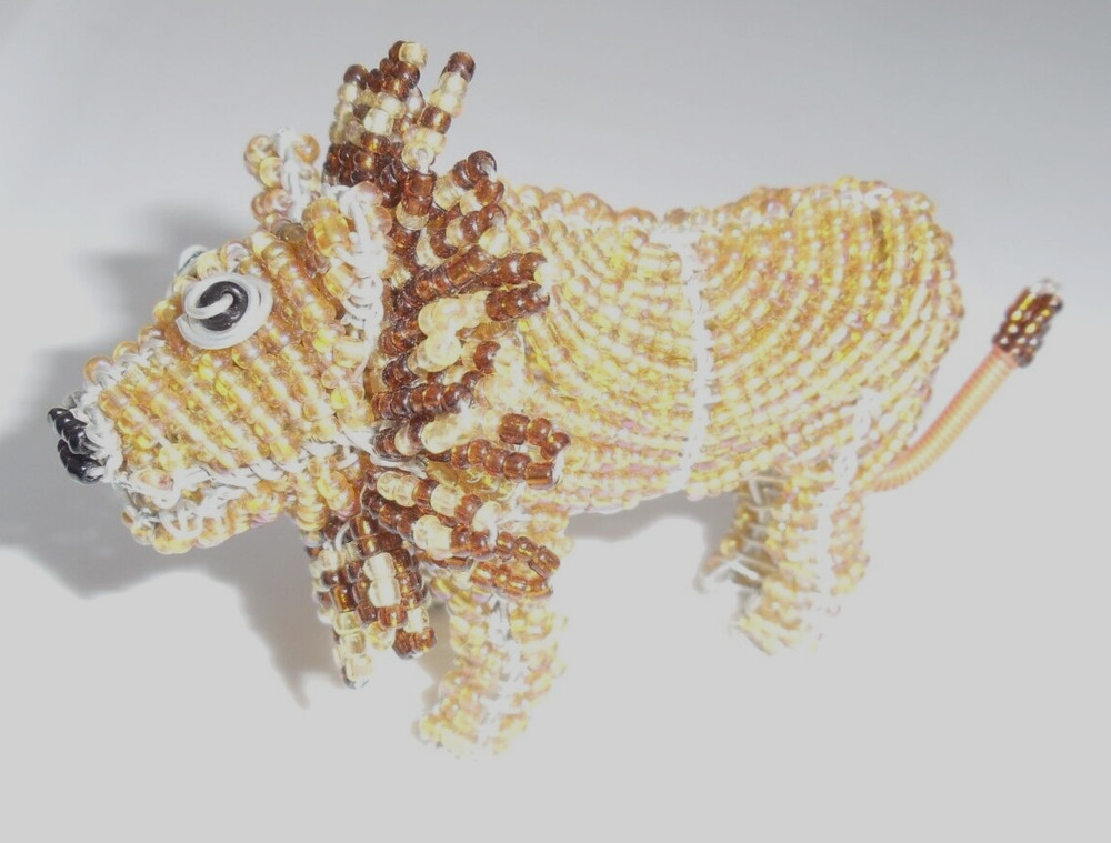 Beaded land: Miniature lion