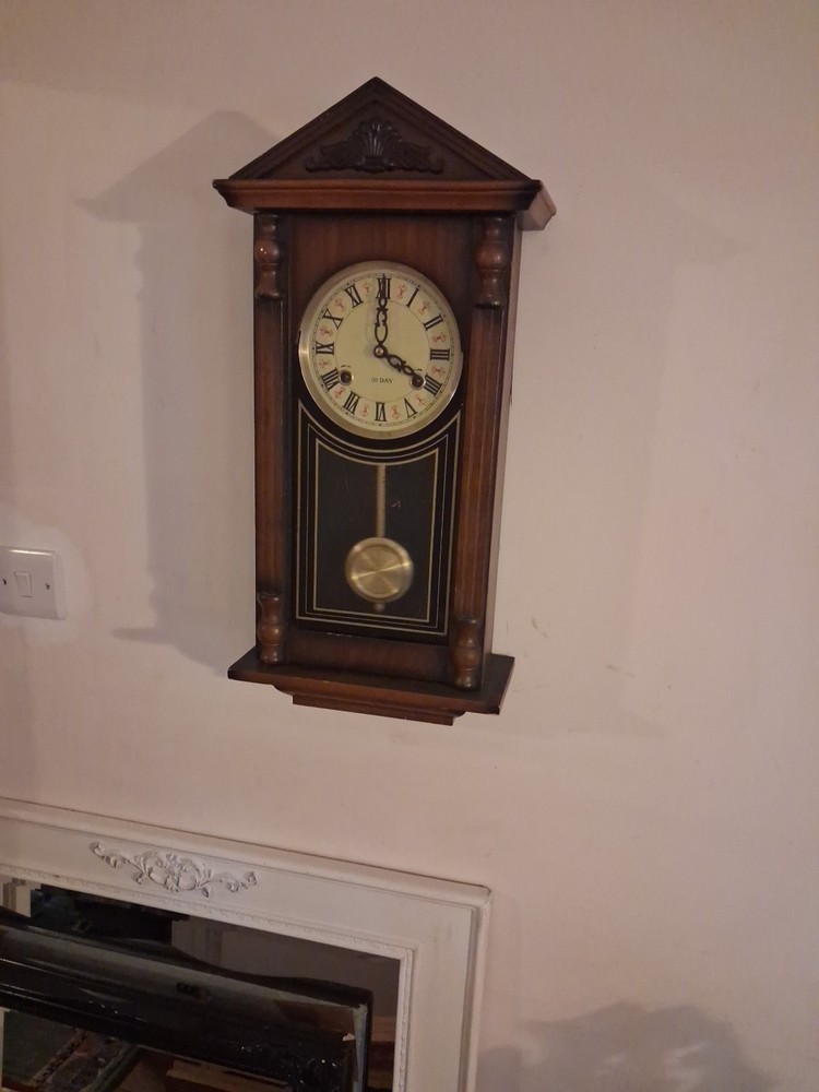 31 Day pendulum wall clock with key clock in working order Sorry Don't No Maker