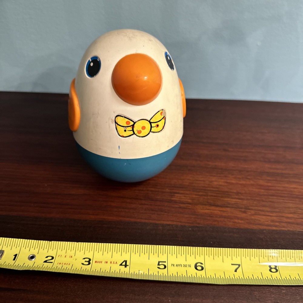 Vintage Musical Roly Poly Penguin pull behind toy