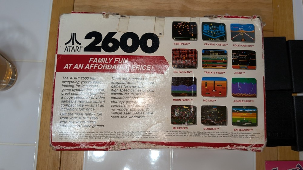 atari game, instructions, and limited 90 day warranty card bundle. no console