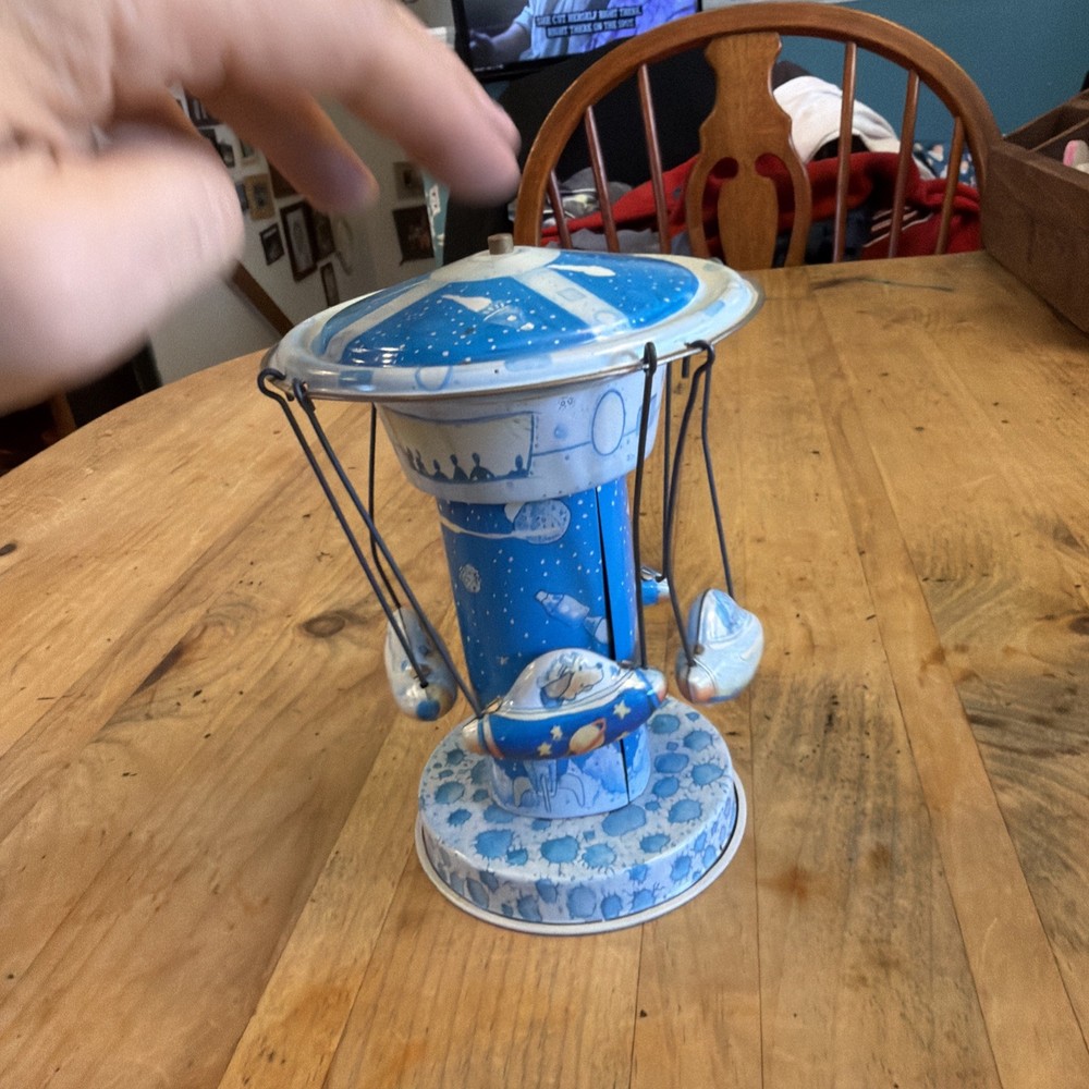 OLD METAL TIN ROCKET CAROUSEL SCHYLLING SPACE TOY