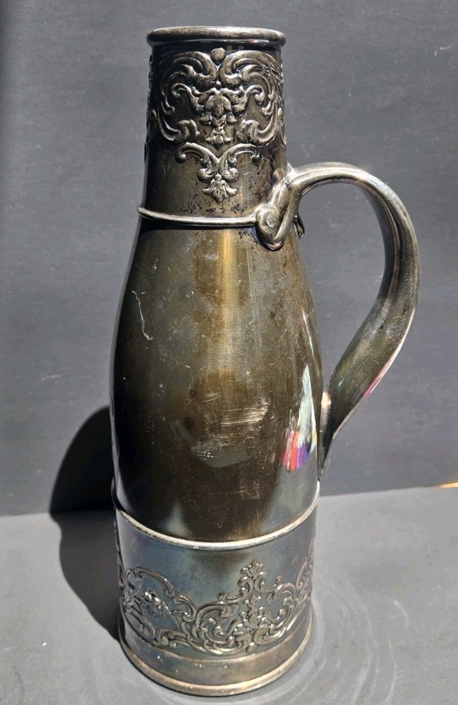 Wilcox International Silver Company silverplate engraved decanter with handle
