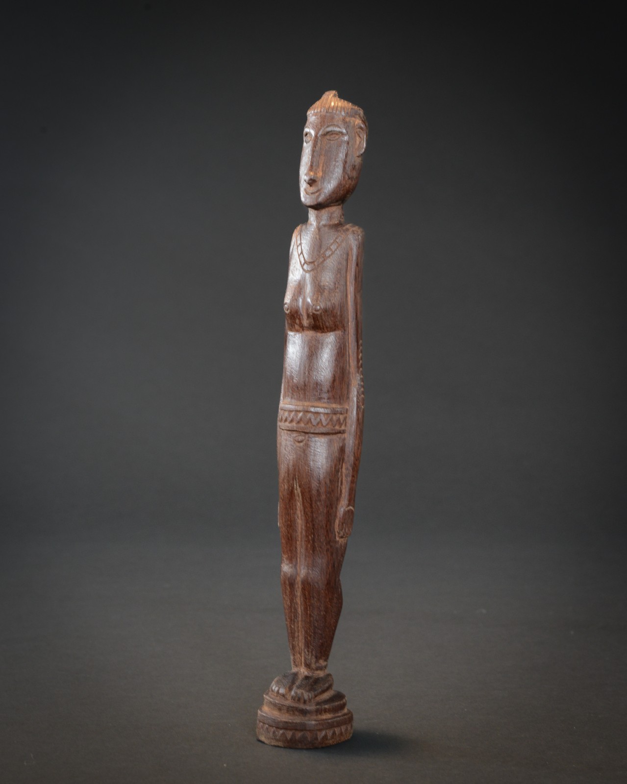 FEMALE ANCESTOR FIGURE, Massim, Papua New Guinea.