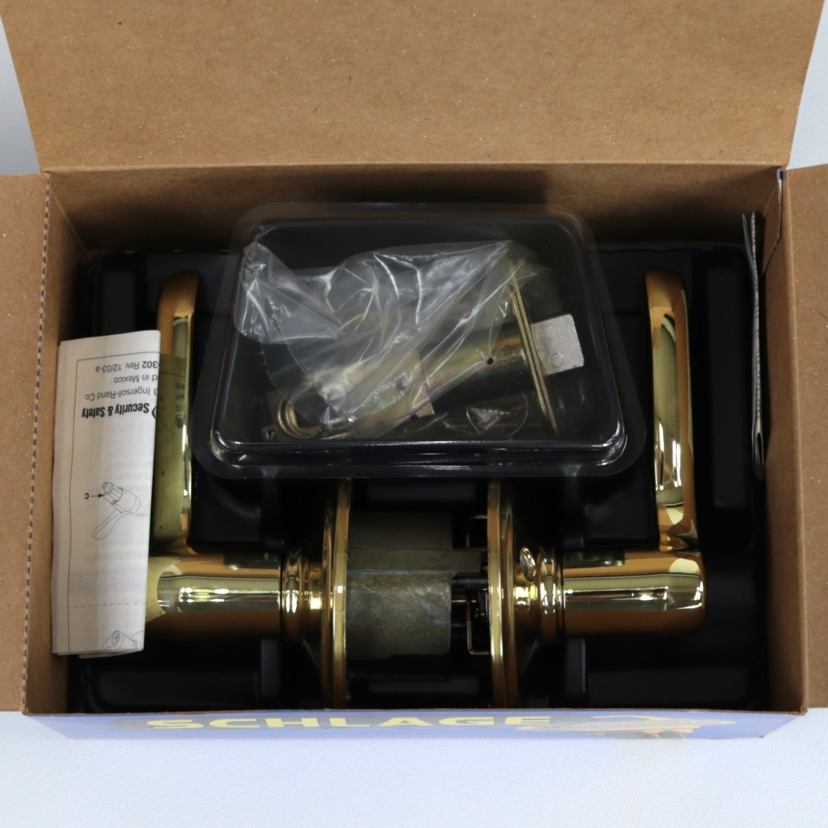 Schlage Flair Reversible Privacy Lock Lever Set in Polished Brass F40 FLA 605