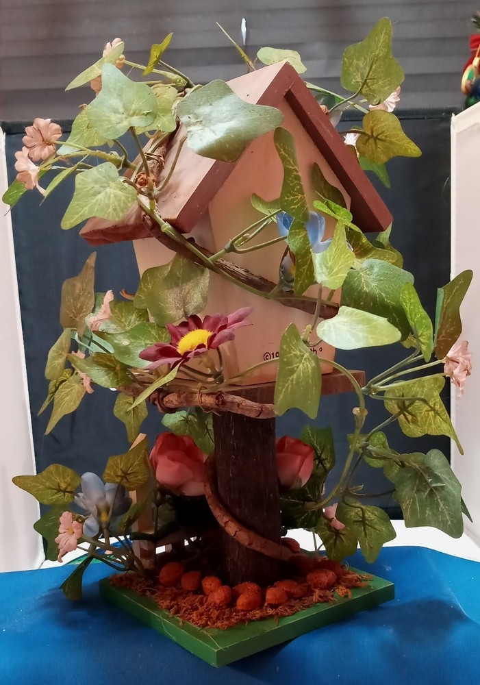 VINE COVERED BIRDHOUSE