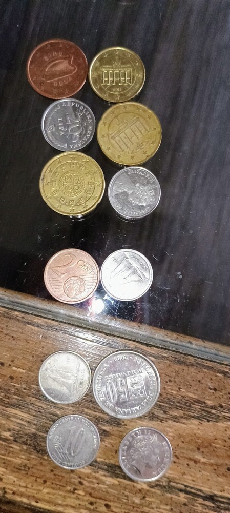 foreign coins lot 2 dozen assorted pieces.