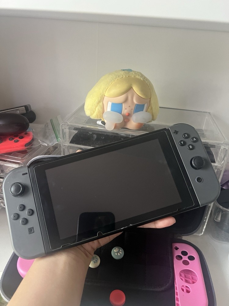 Nintendo Switch Console w/ Joy-Con, Grip, tomtoc Case, Thumb Grips