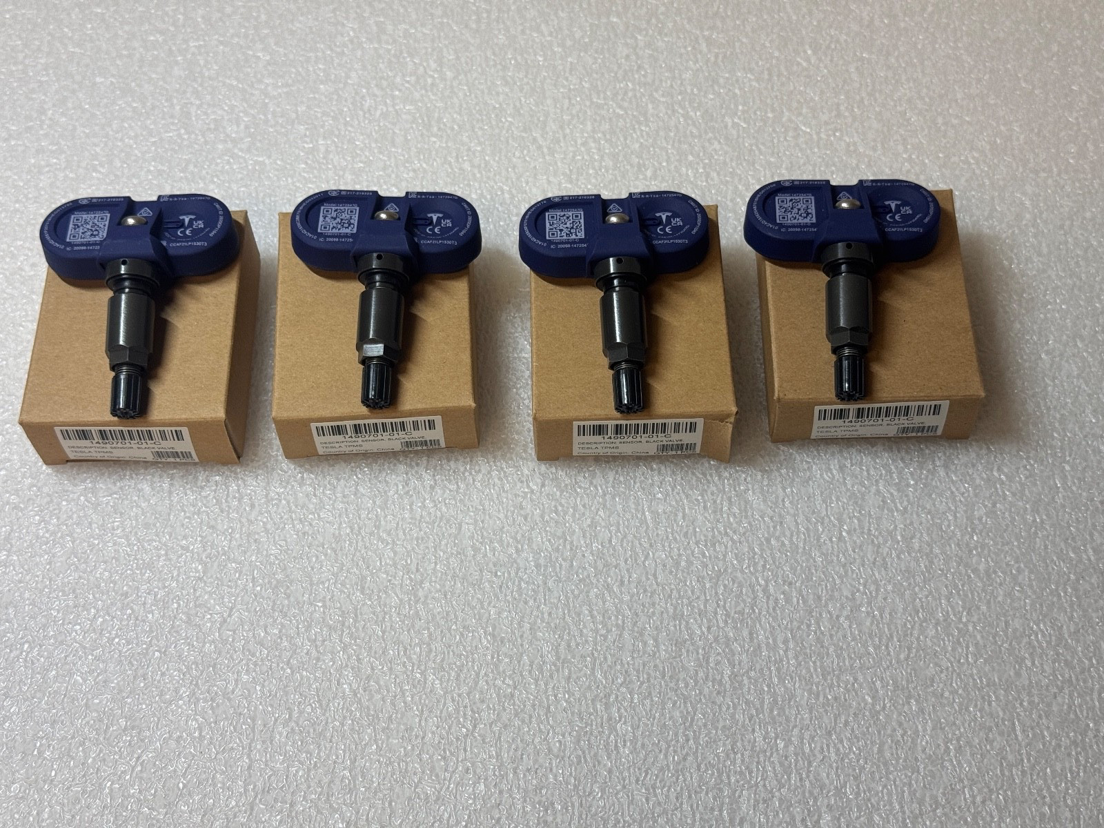 Set of 4 NEW OEM Tesla Model 3 S X Y Bluetooth TPMS Sensor with Nut 1490701-01-E