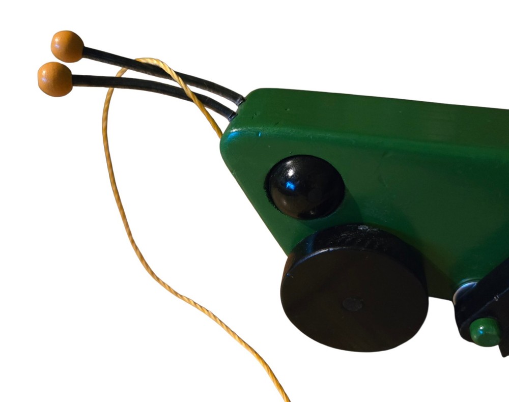 Green Grasshopper handcrafted Wooden Rolling Pull Toy