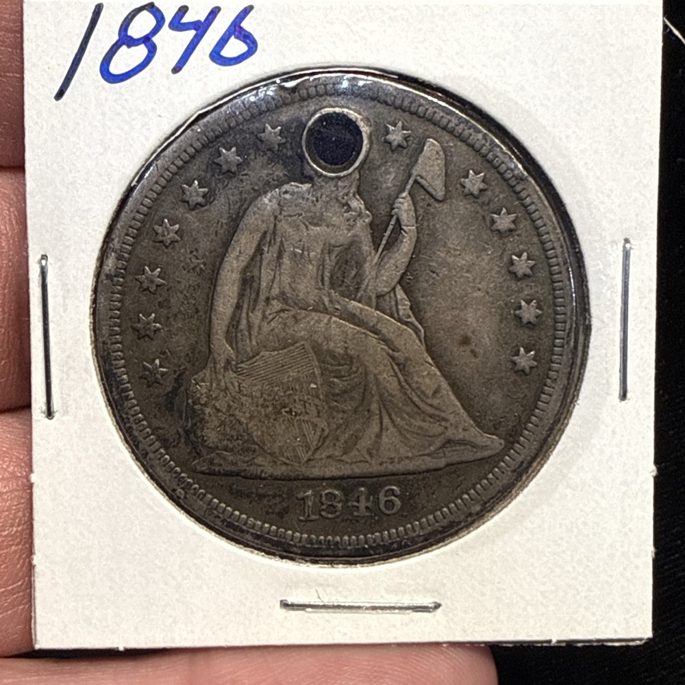 1846 Seated Liberty Dollar Holed.