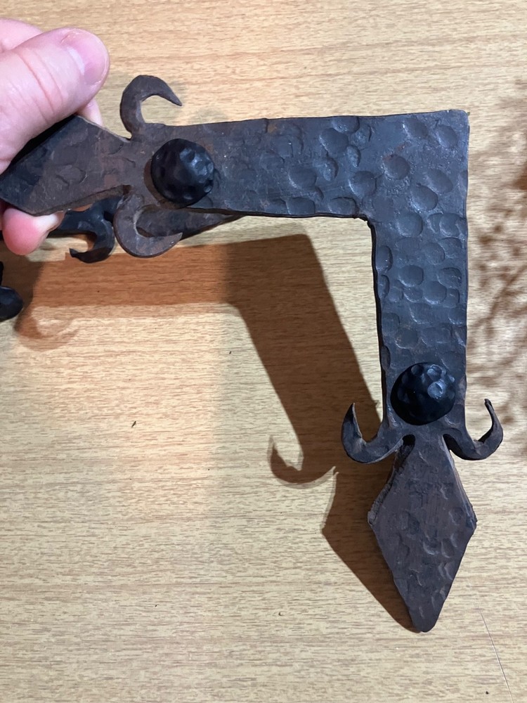 Mexican hand forged iron corner set with conchos